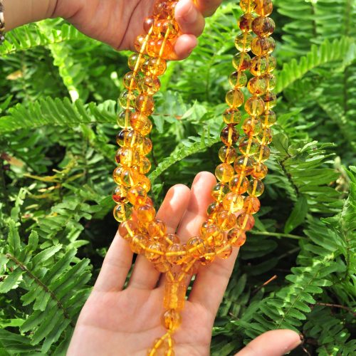 Vòng 108 hạt hổ phách vàng 11 ly